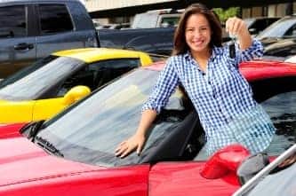 Woman with new car