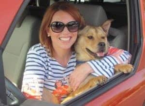 Belinda and Bodie the dog in car